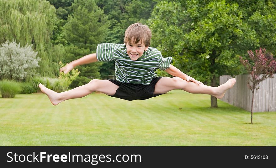 Boy Doing Jumps in the Air. Boy Doing Jumps in the Air