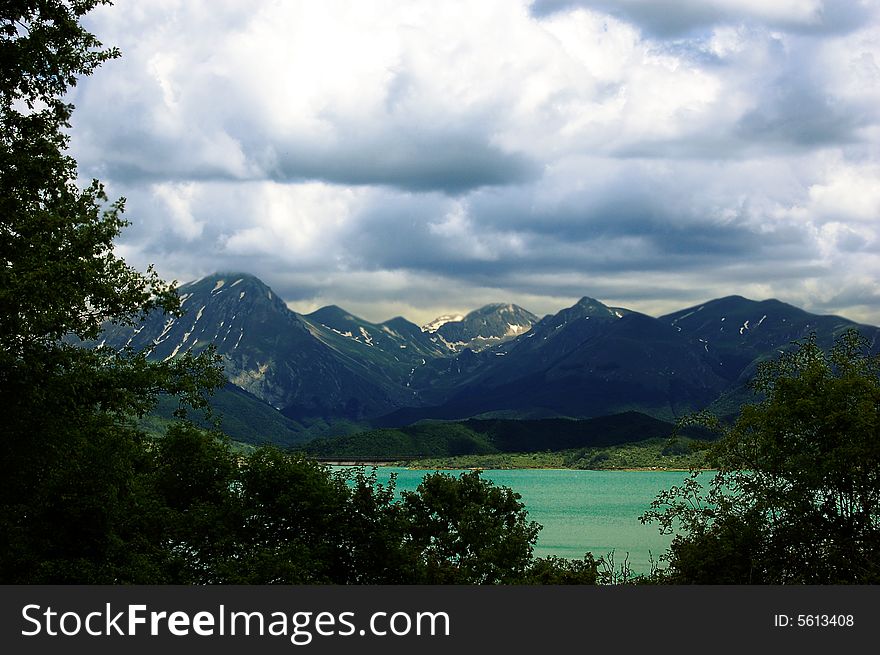 Mountains view with threatening sky. Mountains view with threatening sky