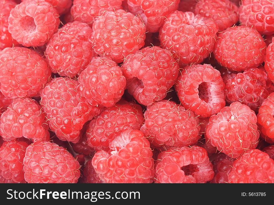 Ripe red raspberries as background. Ripe red raspberries as background