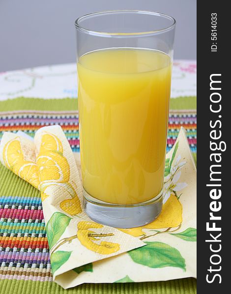 Glass of Orange Juice on a serviette