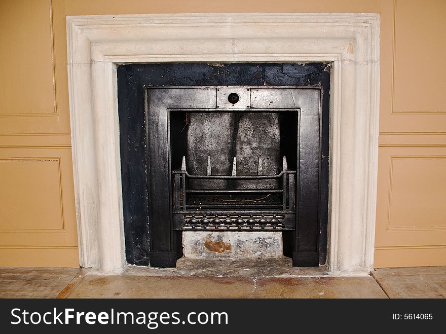 An authentic and historic fireplace in the staff wing of an Elizabethan mansion. An authentic and historic fireplace in the staff wing of an Elizabethan mansion