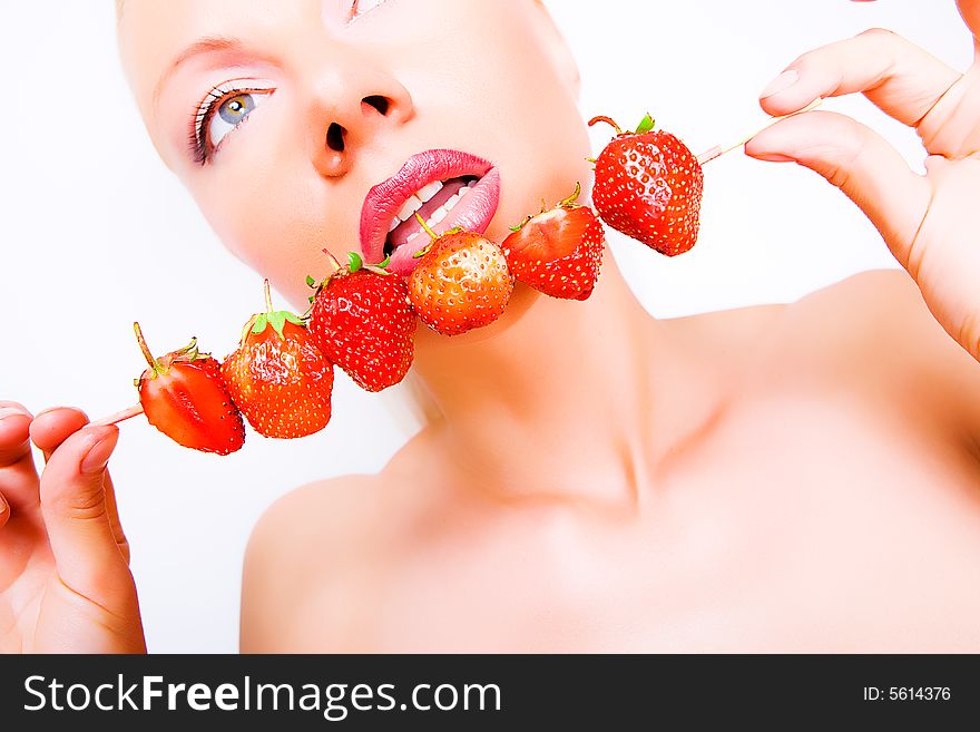 girl with red strawberry isolated on white background. girl with red strawberry isolated on white background