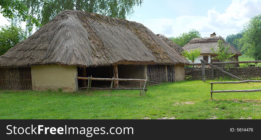 Straw ancient houses on a lawn. Straw ancient houses on a lawn