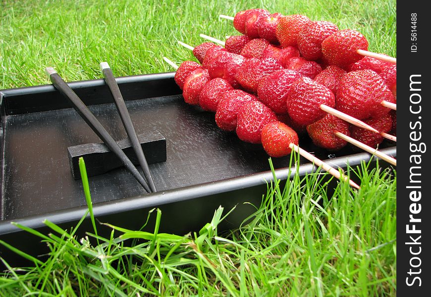 The Japanese style, natural, fresh, wholesome food, a strawberry, a green lawn, fresh air, ecology. The Japanese style, natural, fresh, wholesome food, a strawberry, a green lawn, fresh air, ecology.