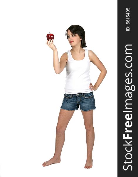 Helathy looking teenage girl holding red apple
