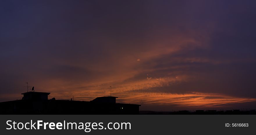 A city in a red sea at the sunset. A city in a red sea at the sunset