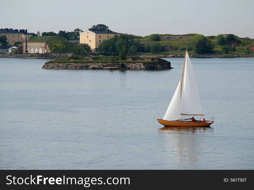 Small Sail Boat moving at quiet water