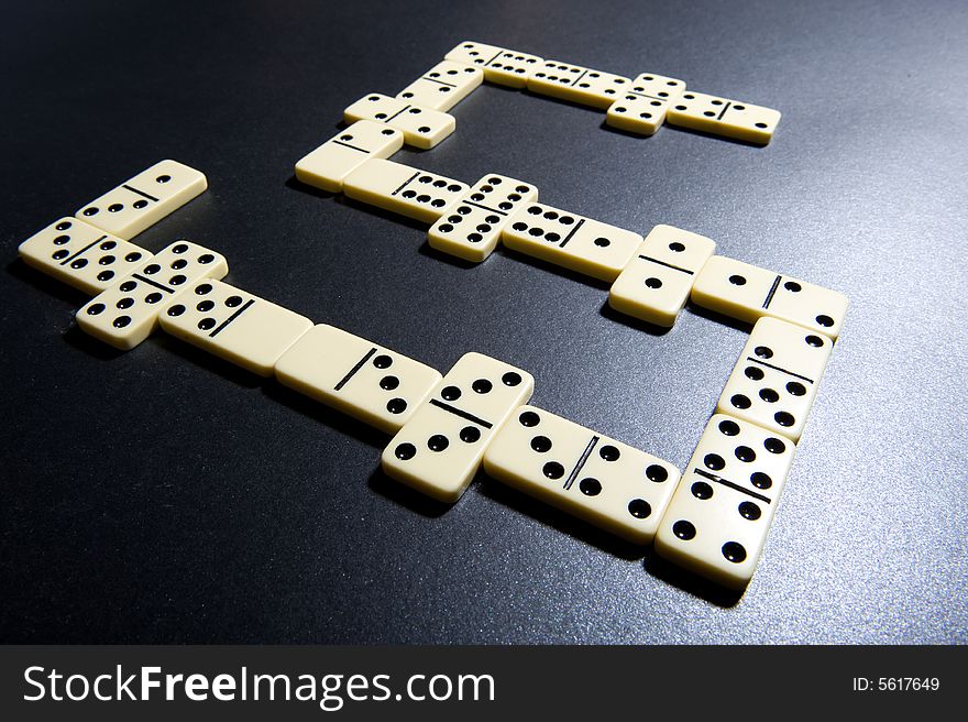 Close up of dominoes. Business concept