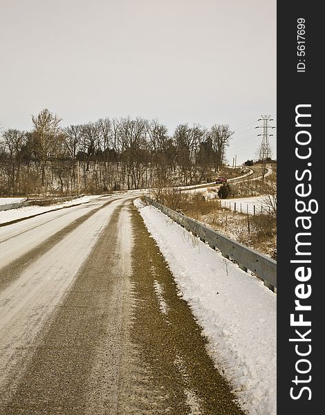 Winter rural road crossing bridge. Winter rural road crossing bridge