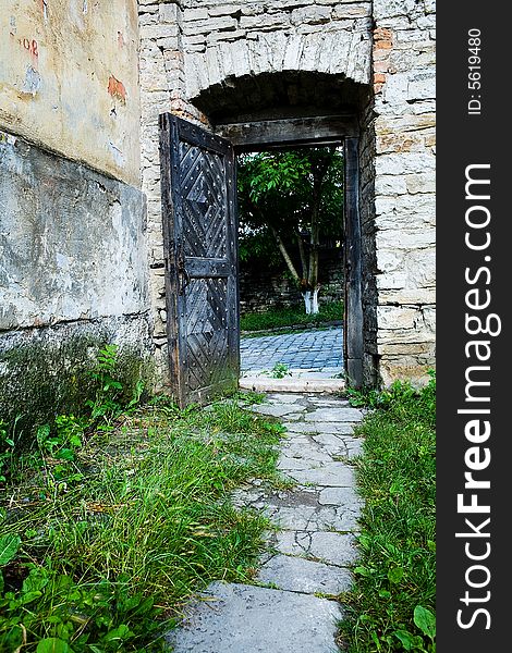 An image of open iron door of a fortres. An image of open iron door of a fortres