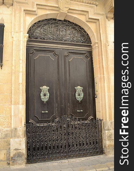 Antique door of a building in the classical style. Antique door of a building in the classical style