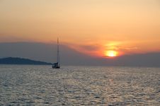 Sailboat Sailing Into Sunrise Stock Images Sailboat Sailing Into Sunrise Stock Images