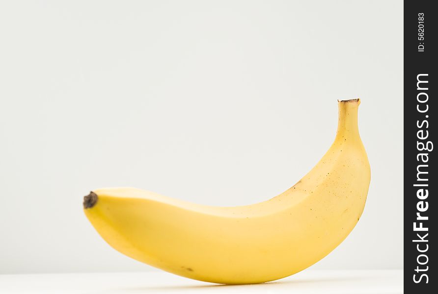 A ripe, yellow banana isolated on white. A ripe, yellow banana isolated on white.