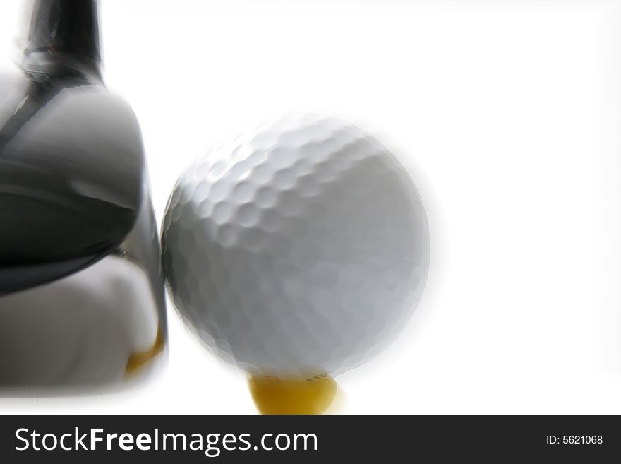 Game of Golf - Golf ball on a tee with golf club (driver). Game of Golf - Golf ball on a tee with golf club (driver)