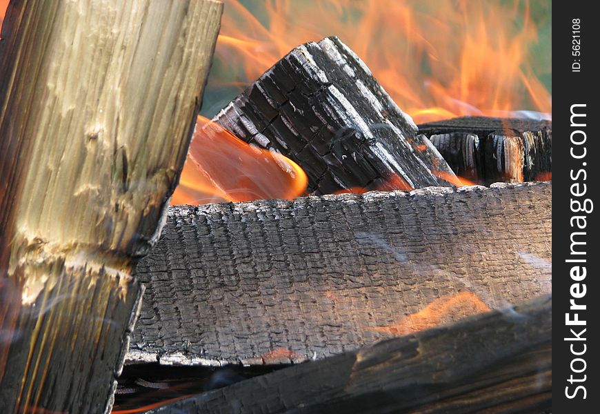 Burning fire wood for a shish kebab
