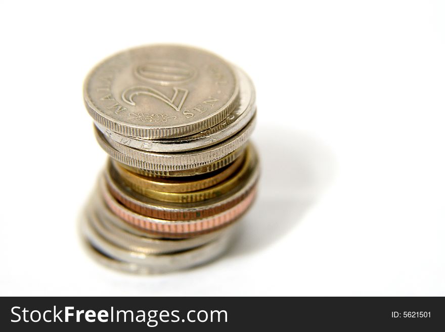 A stack of coins against a white background