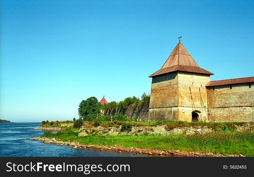 Ancient fortress with the tower near the river. Ancient fortress with the tower near the river