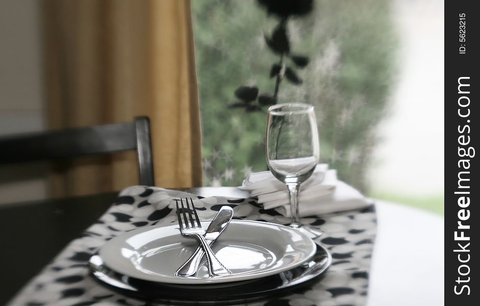 A table set for dinner with special effect focus. A table set for dinner with special effect focus