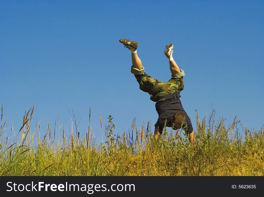 Man jumping on a meadow