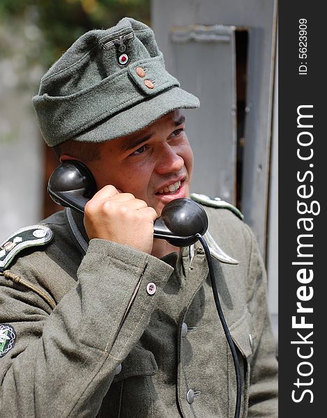 German soldier with phone.