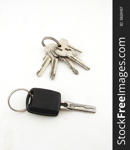 Silver keys isolated over white background.