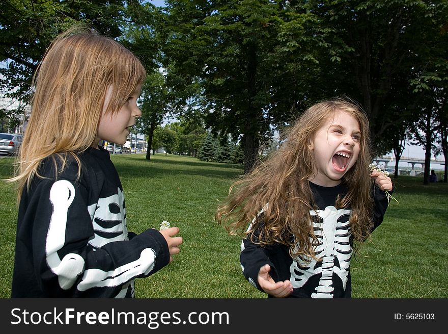 Little girls dressed as a sketeton makie faces. Little girls dressed as a sketeton makie faces