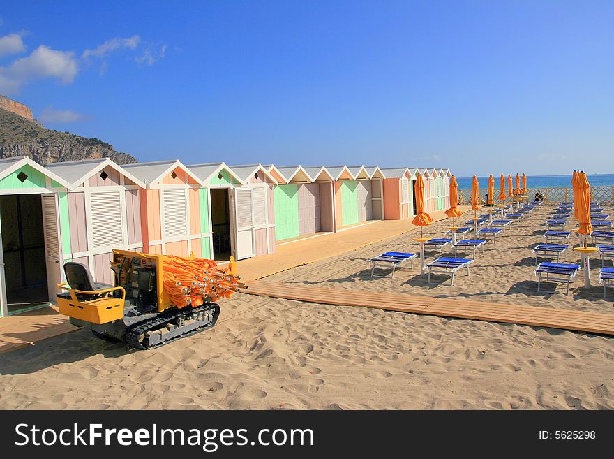 Mediterranean furnished beach area with colorful huts. Palermo (island of Sicily) Italy. Mediterranean furnished beach area with colorful huts. Palermo (island of Sicily) Italy