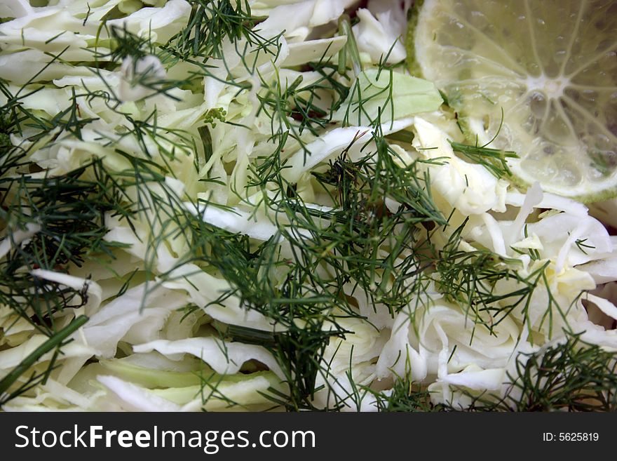 Salad from cabbage with fennel, lime and an olive oil