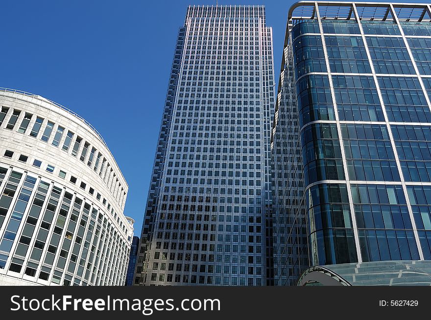 Three buildings in the Canary Wharf financial center in London. Three buildings in the Canary Wharf financial center in London