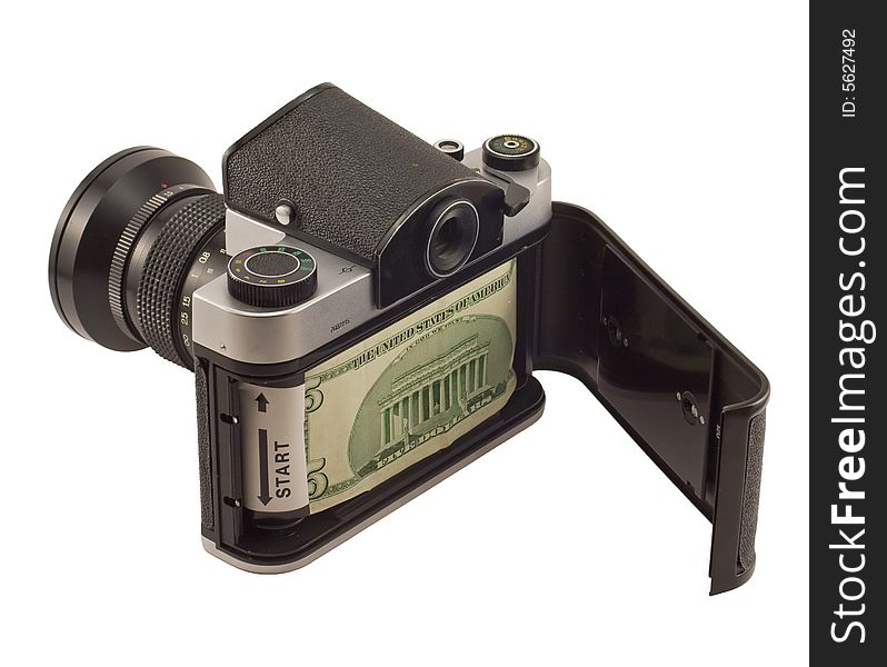 Old reflex camera with banknote  instead of a photofilm. Old reflex camera with banknote  instead of a photofilm
