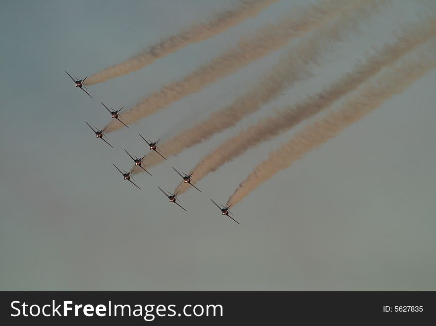 Red arrows formation fly at air show in Quebec. Red arrows formation fly at air show in Quebec