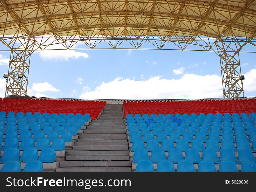 Empty Stadium seats perspective and roof