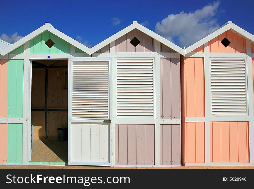 Mediterranean furnished beach area with colorful huts. Palermo (island of Sicily) Italy. Mediterranean furnished beach area with colorful huts. Palermo (island of Sicily) Italy