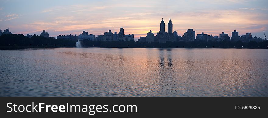 Manhattan sunset over the reservoir in central park