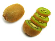 Sliced And Unsliced Kiwi From Above Royalty Free Stock Photos Sliced And Unsliced Kiwi From Above Royalty Free Stock Photos