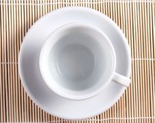 White Cup On Bamboo Background Stock Photography White Cup On Bamboo Background Stock Photography
