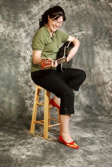 Woman With Guitar. Stock Photos Woman With Guitar. Stock Photos