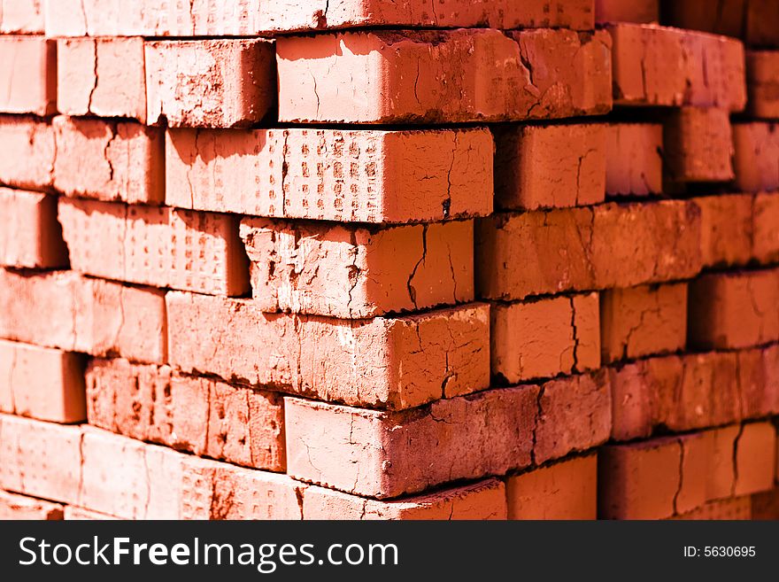 Big heap of red bricks