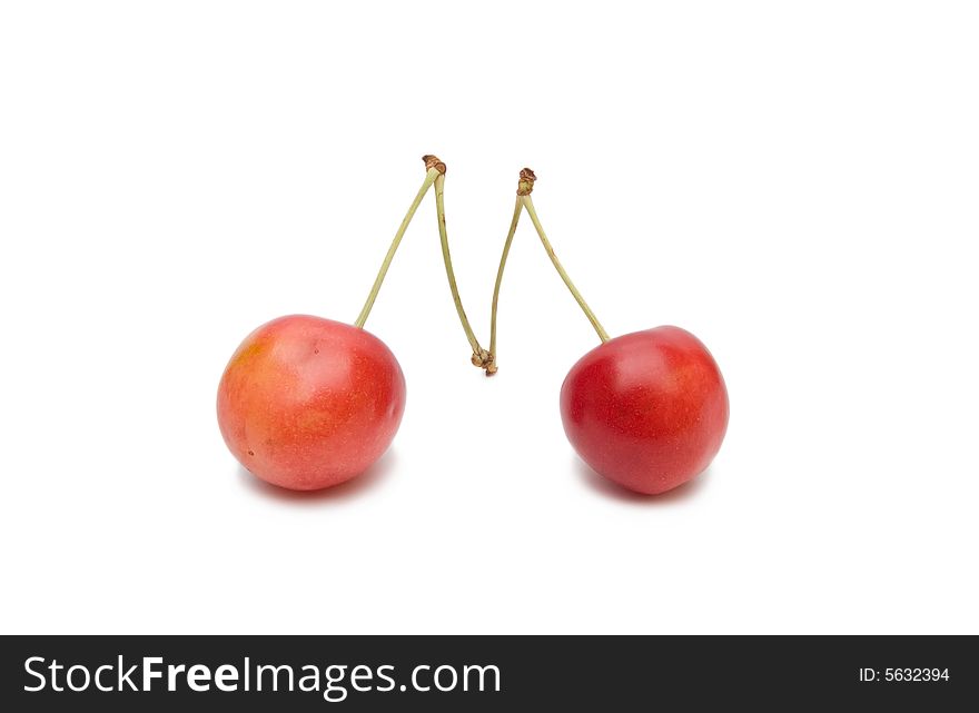 Two cherries isolated on white