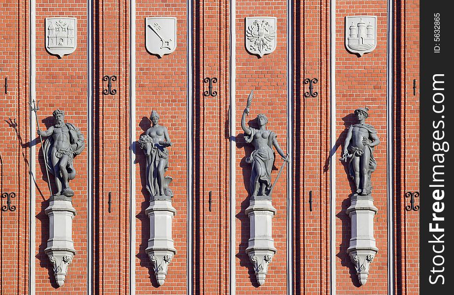 Four sculptures on Blackheads house wall in Riga. Four sculptures on Blackheads house wall in Riga.