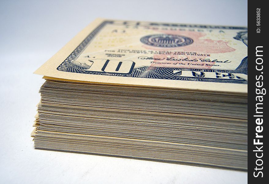Pack of dollars on a light background. Pack of dollars on a light background