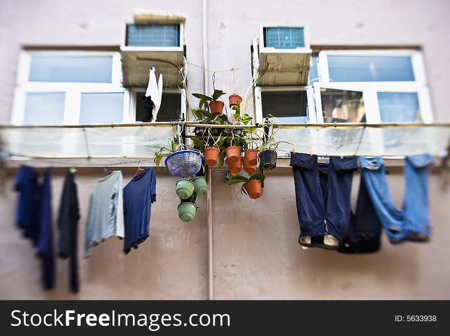 Washed clothes hanging outside, taken with Lensbaby 2.0. Washed clothes hanging outside, taken with Lensbaby 2.0.