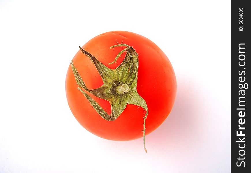 Tomatoes on a white background. Tomatoes on a white background