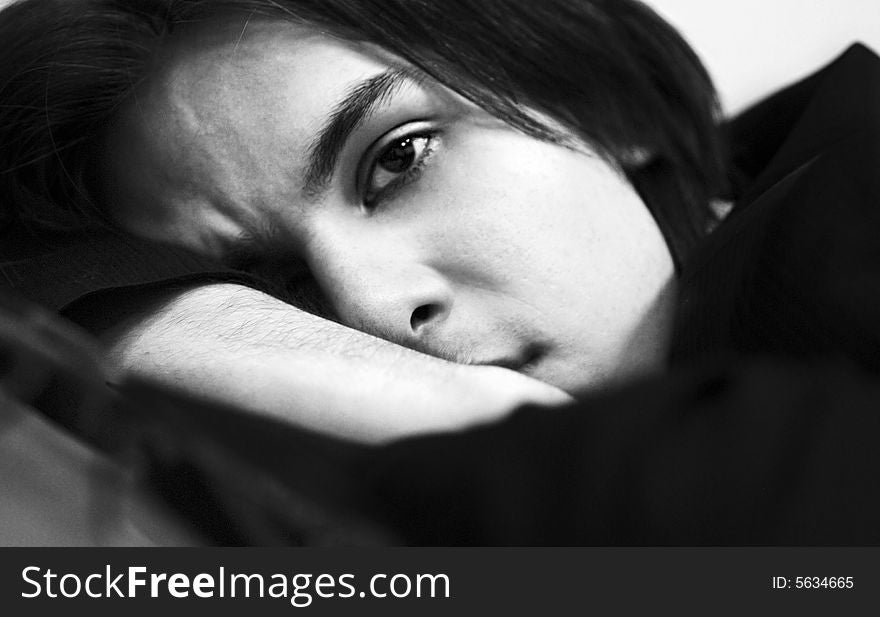Black and white photo of young tired brunet. Black and white photo of young tired brunet
