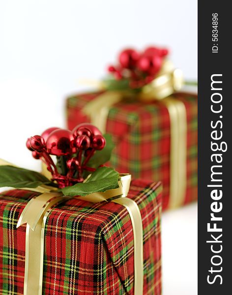 Two checkered gift boxes