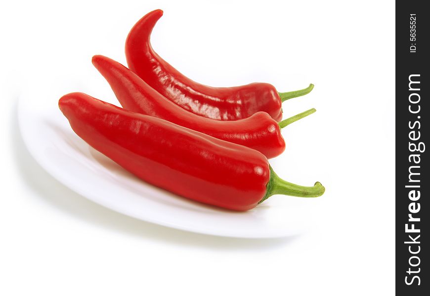 Tasty Red Peppers On White Plate