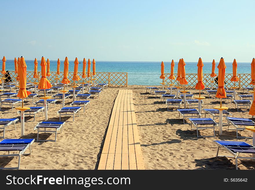 Mediterranean furnished beach area with colorful huts. Palermo (island of Sicily) Italy. Mediterranean furnished beach area with colorful huts. Palermo (island of Sicily) Italy