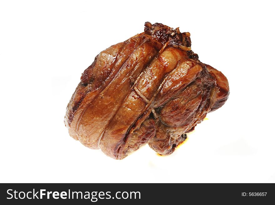 Roasted meat joint isolated on a white background. Roasted meat joint isolated on a white background