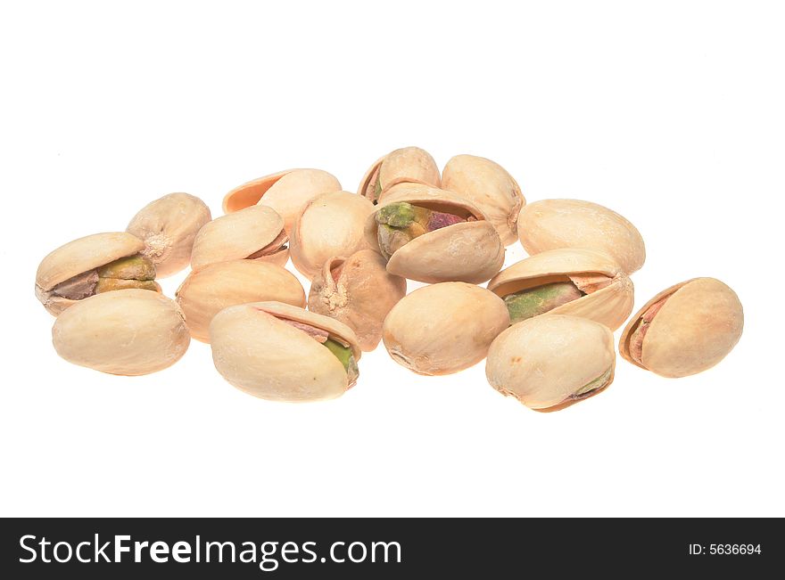 Pistachio nuts isolated on a white background. Pistachio nuts isolated on a white background