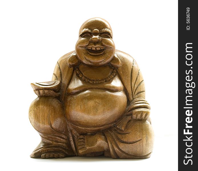 Smilling, wood-carved buddha isolated on a white background. Smilling, wood-carved buddha isolated on a white background
